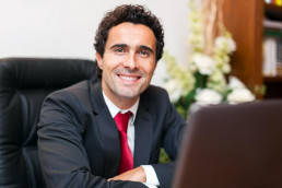 Accountants for law firm concept - smiling man in business suit